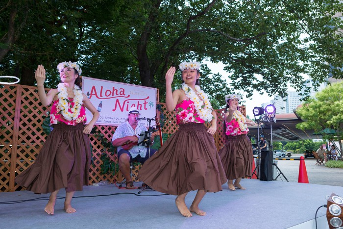 The event was an opportunity to enjoy hula dancing and Hawaiian music with a Kona beer in hand.