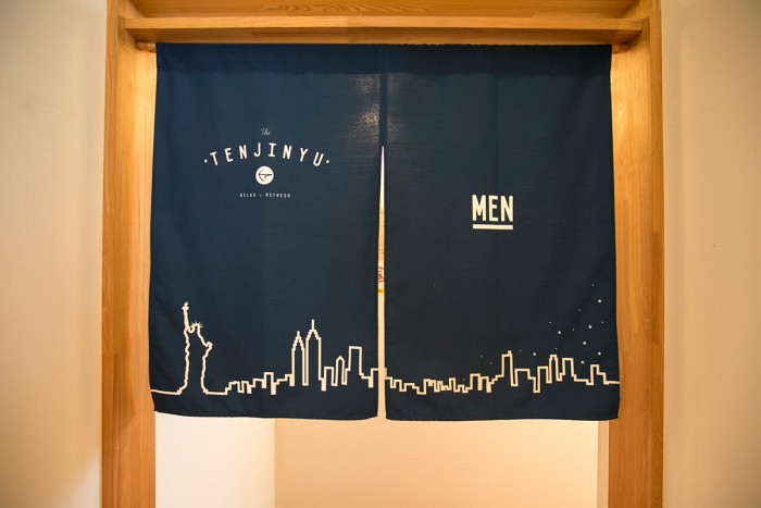 A stylish original door entrance curtain featuring the New York skyline.