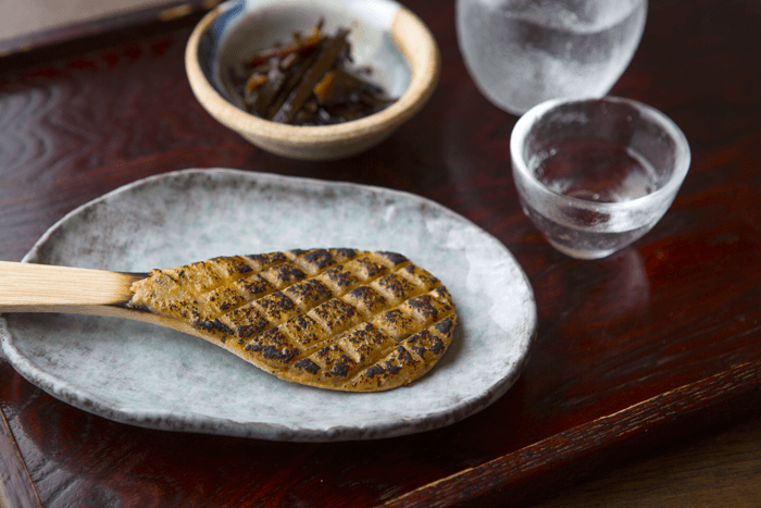 Sauteed miso, made with shiso leaves, leeks, yuzu citrus, and soba grains, etc., 320 yen.